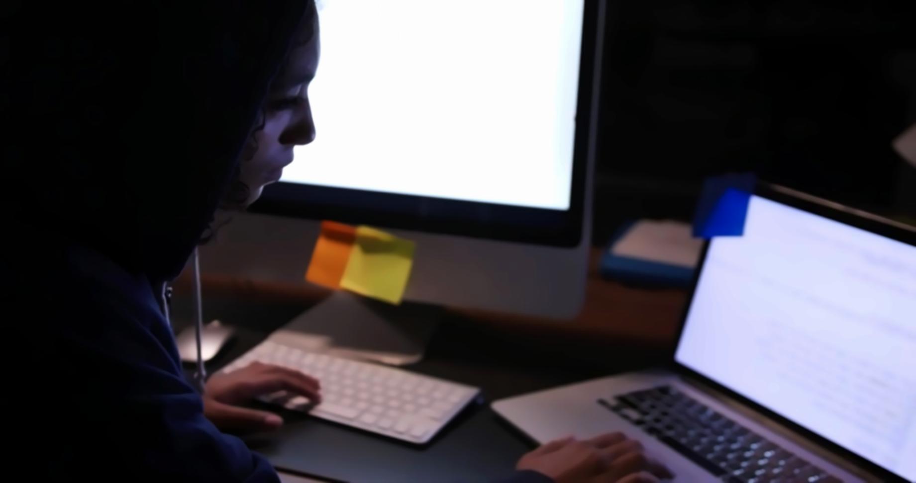 Professional workspace showing mobile app development tools and user experience design